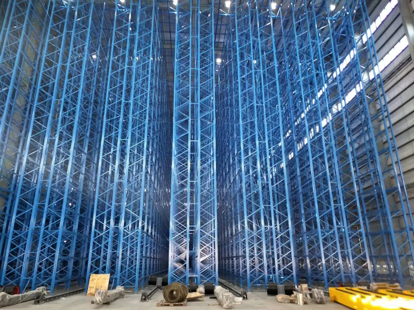 30 metre high-bay racking towers under installation for a frozen-goods AS/RS project in Malaysia